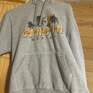 Grey. Cancun sweatshirt, I got it in the airport so it was pretty spendy